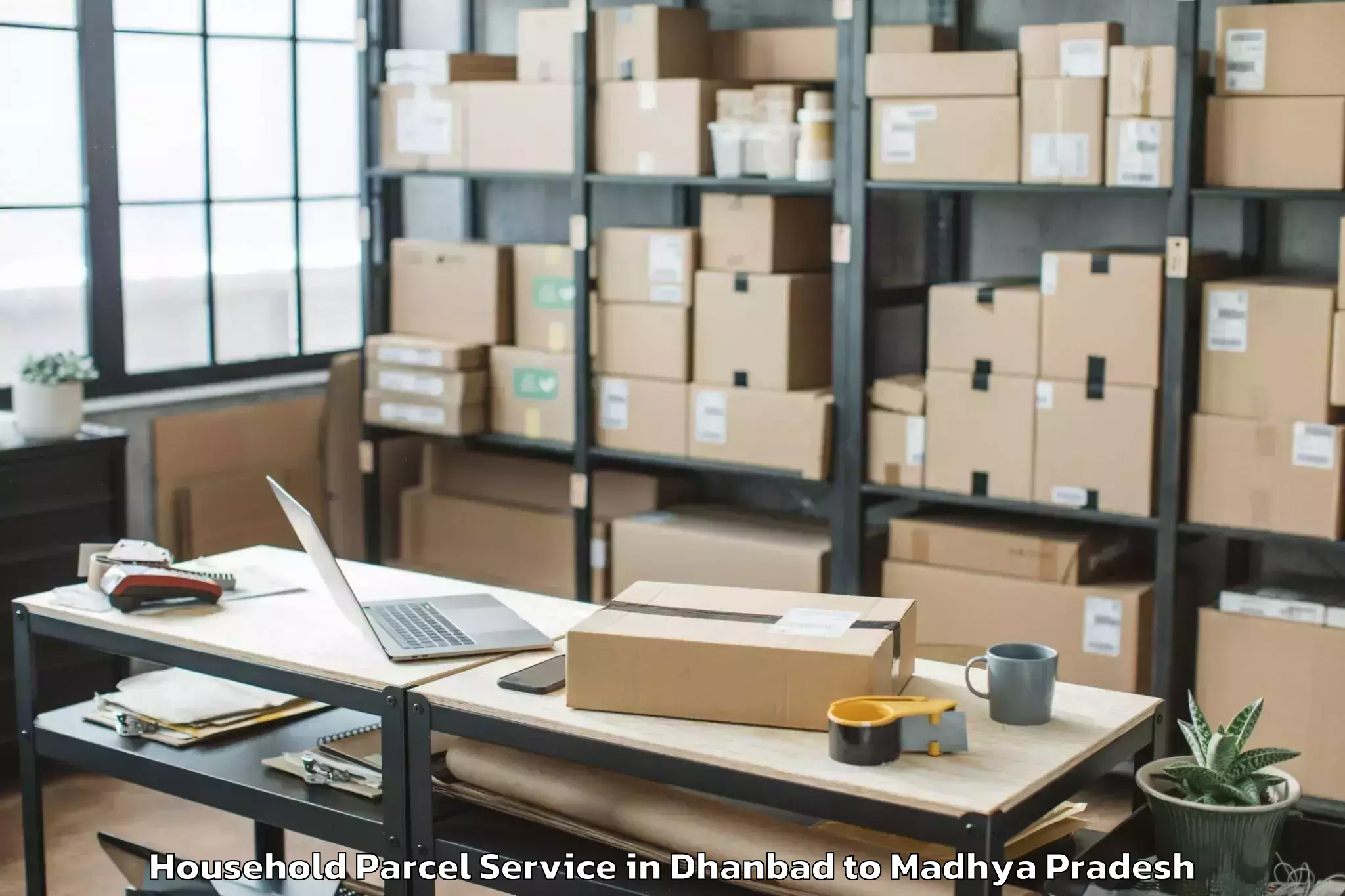 Book Dhanbad to Malwanchal University Indore Household Parcel Online